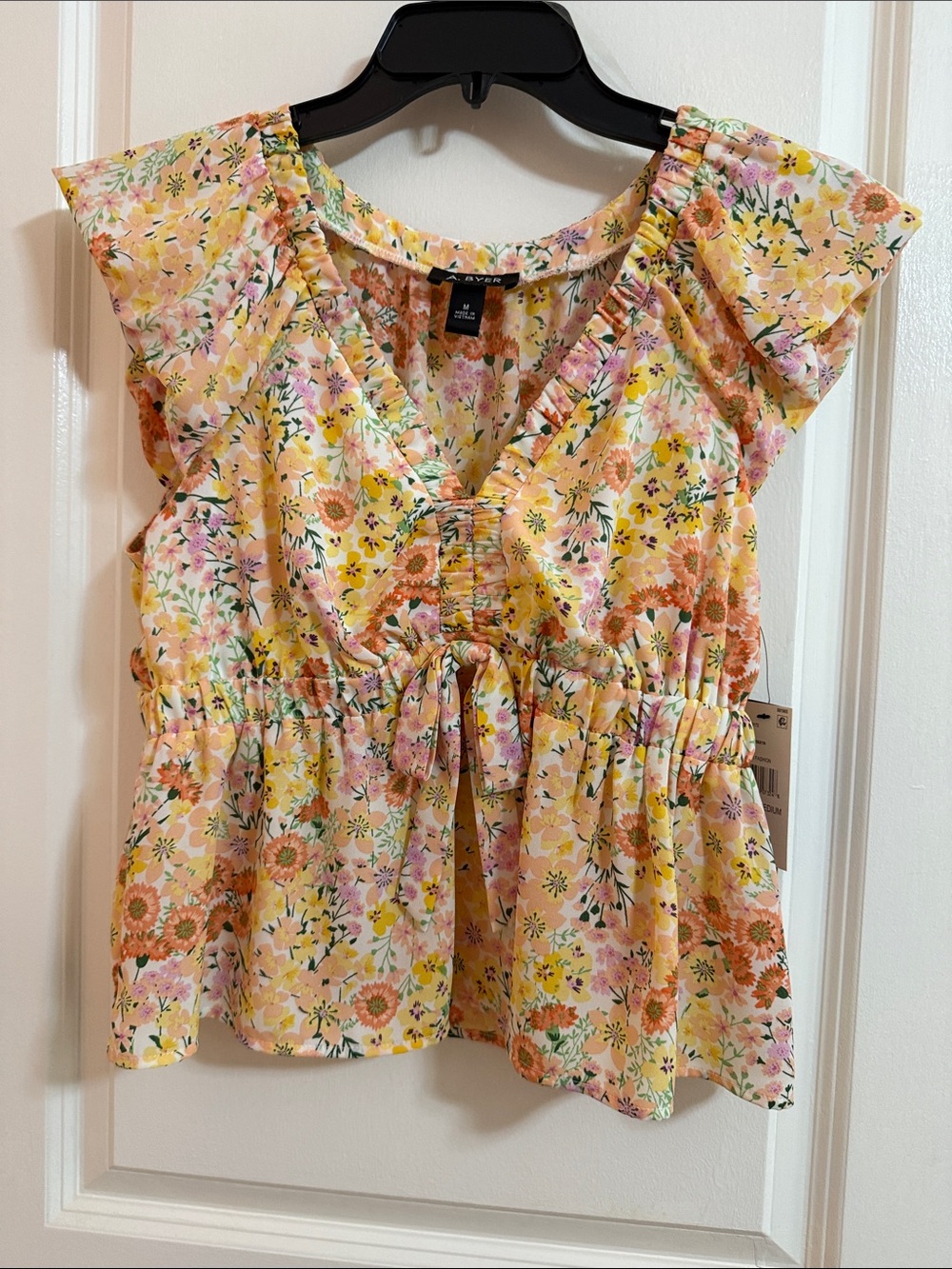 A. Byer Pink Yellow Floral Peplum Tie-Front Top